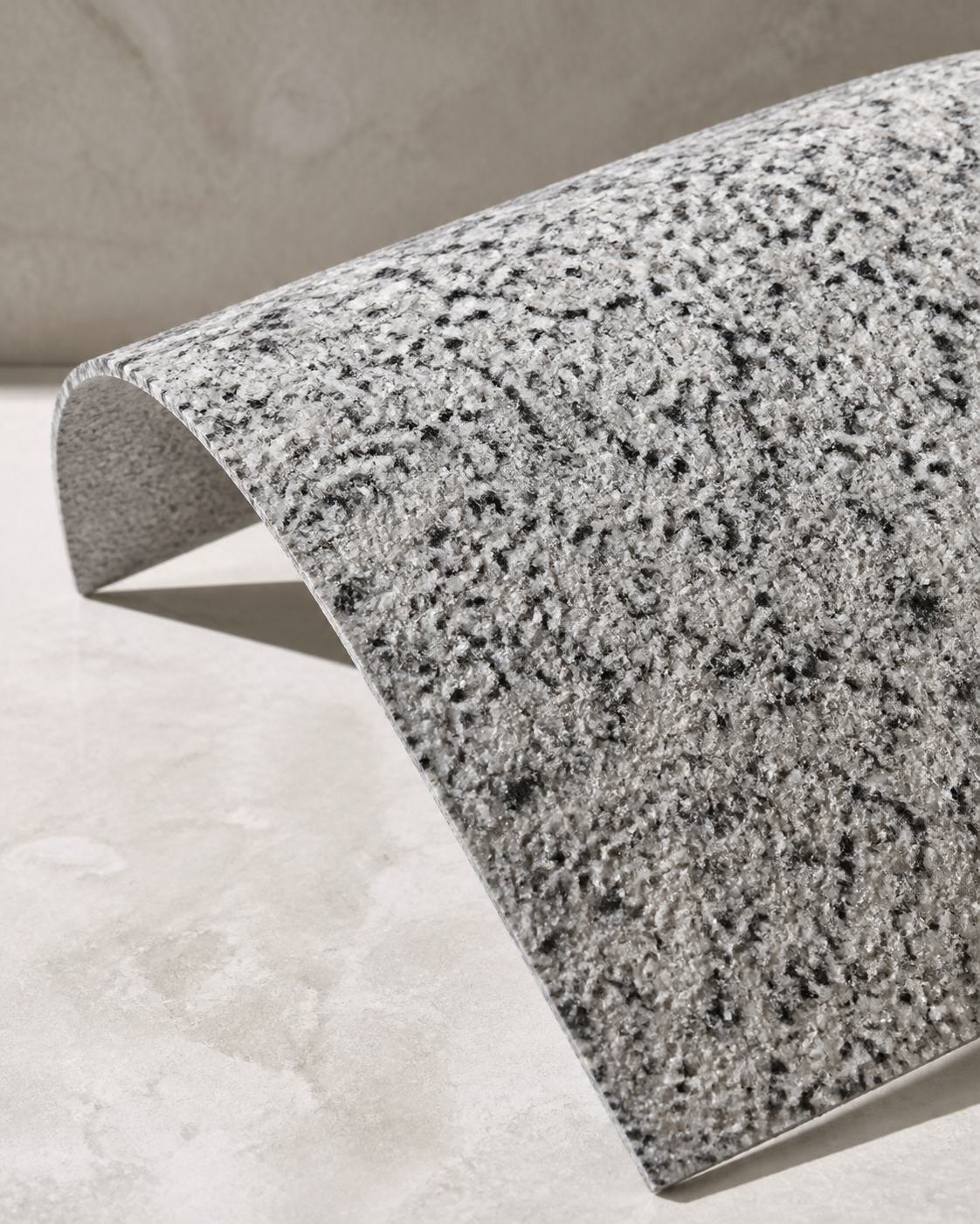 Close-up of RINSUN Rough Granite flexible stone veneer surface texture